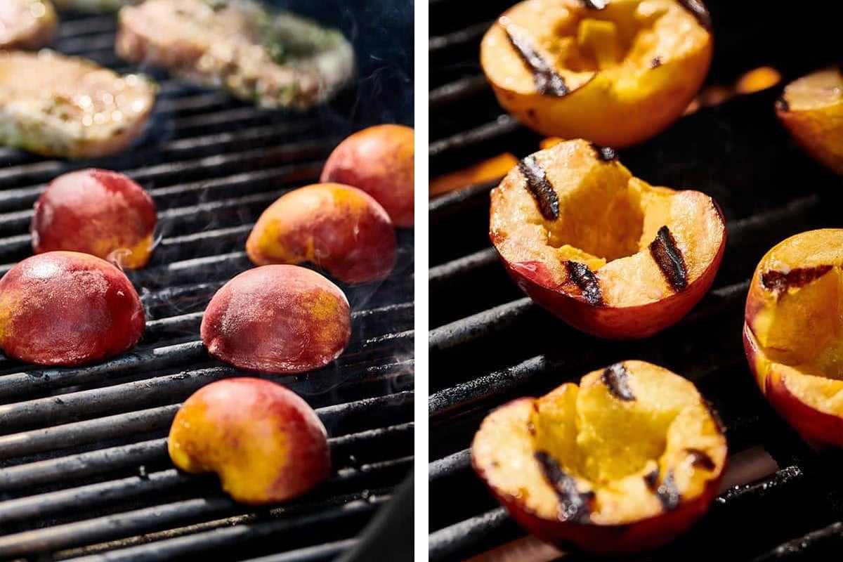 Peach halves cooking on hot grill.