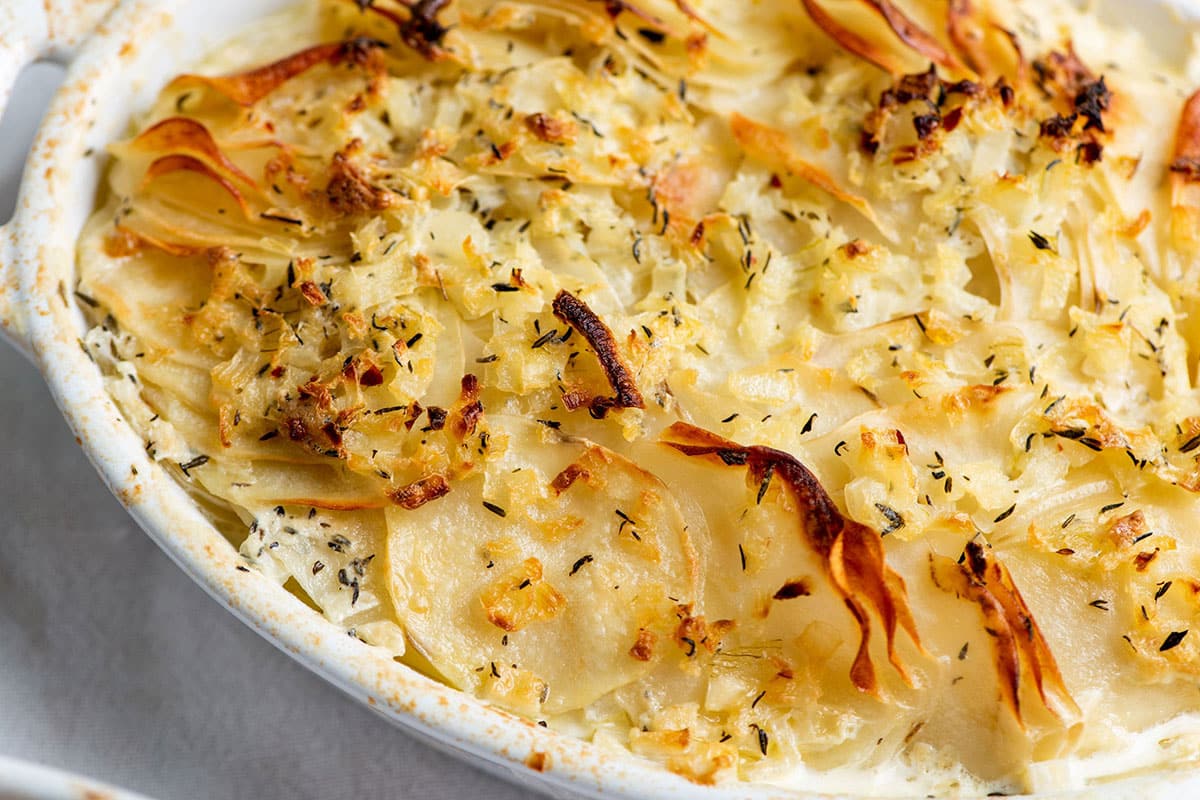 Creamy Scalloped Potatoes in baking dish.