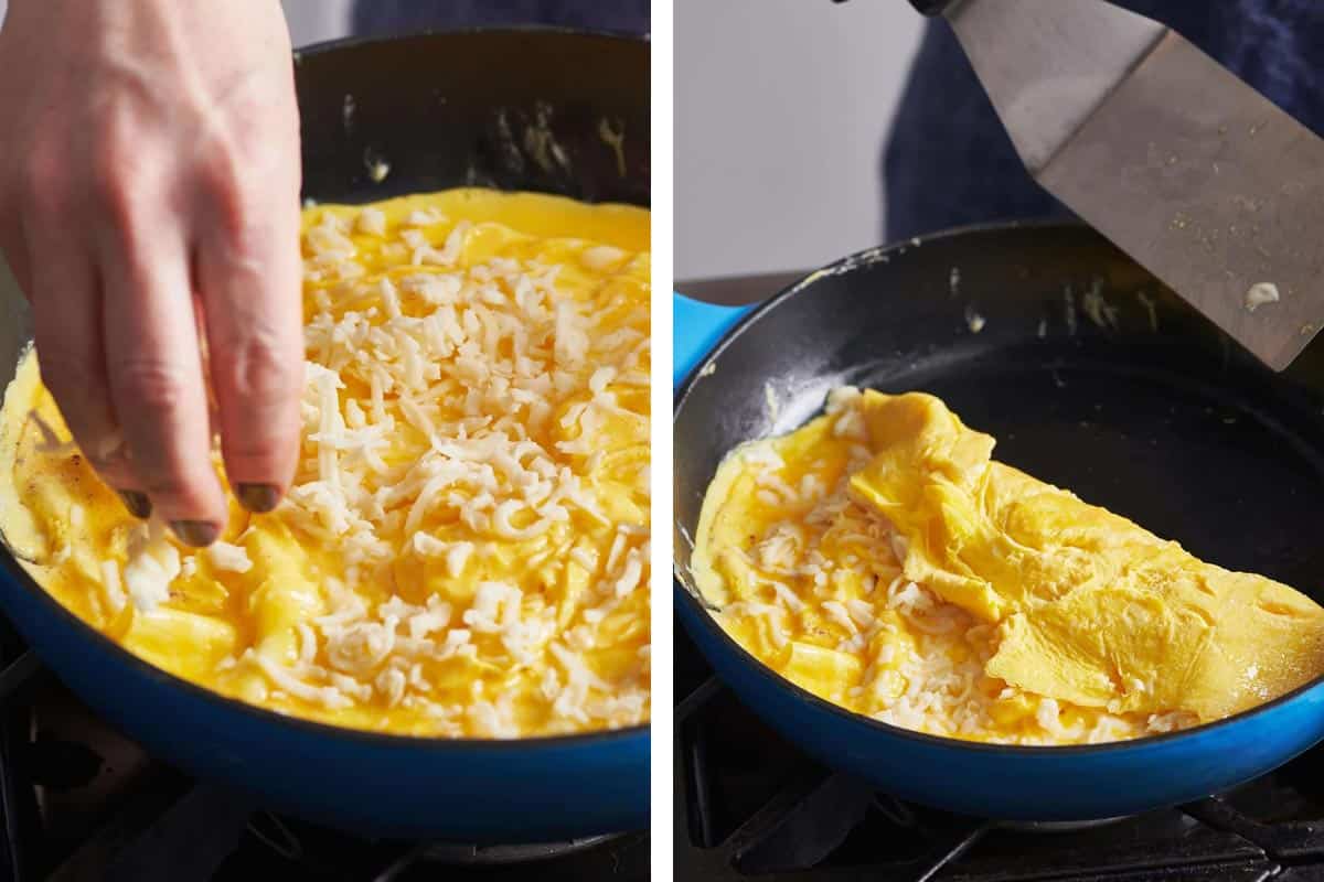Woman sprinkling cheese over eggs in a pan and folding an omelet.