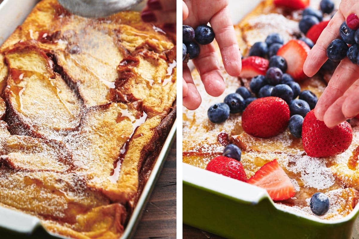 Topping oven-baked French toast casserole with powdered sugar and berries.