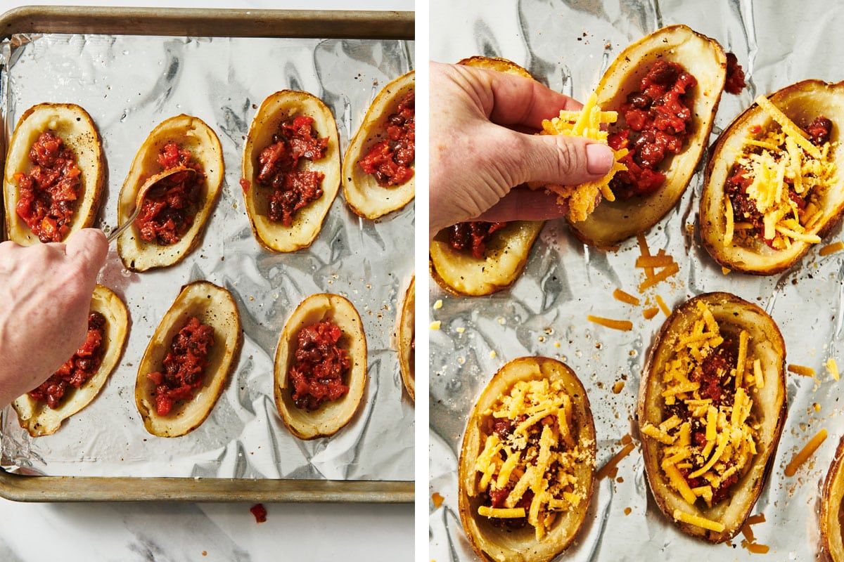 Filling potato skins with black bean mix and shredded vegan cheese.