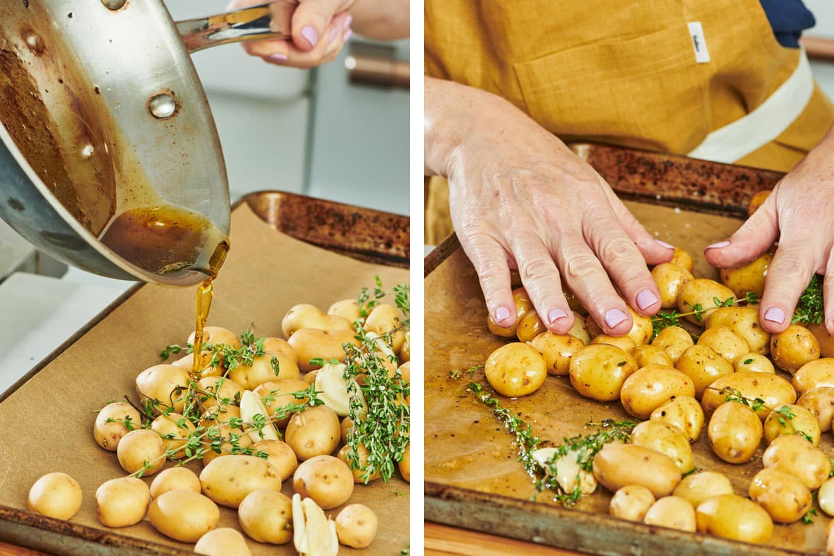 Pouring duck fat over potatoes on baking sheet and tossing with thyme.
