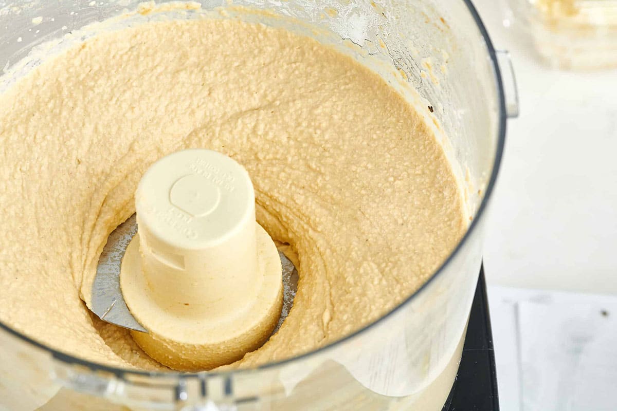 Hummus in a food processor.
