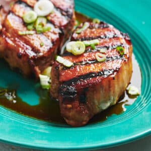 Grilled Soy-Ginger Pork Chops on turquoise plate.