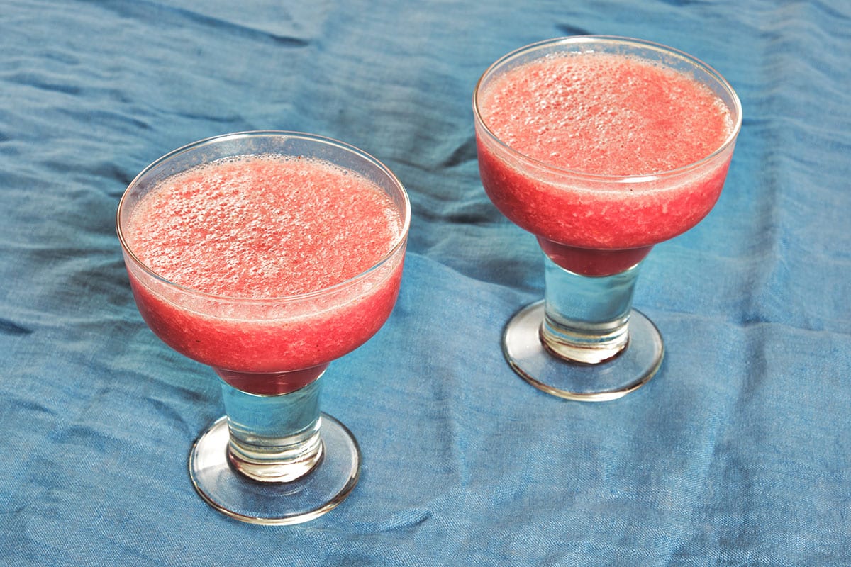 Two glasses with prickly pear margaritas.