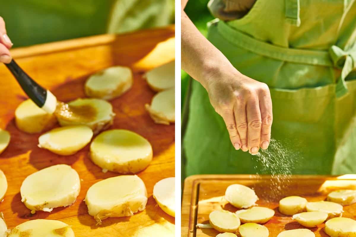 Brushing oil and sprinkling salt on sliced potatoes.