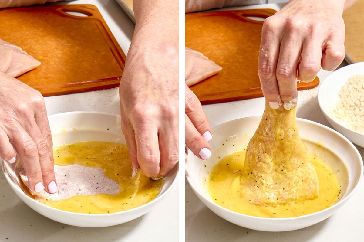 Woman dipping floured chicken into bowl of beaten eggs.