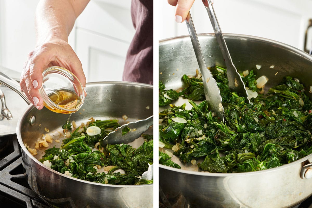 Adding broth to mustard greens cooking in pan and stirring with tongs.