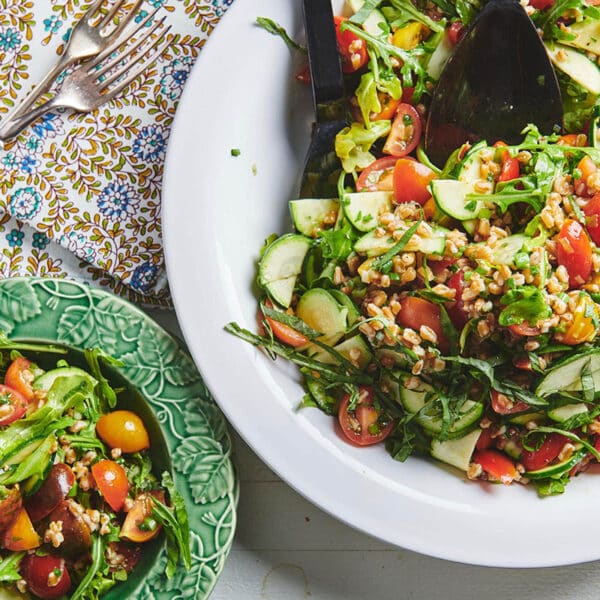 Summer Whole Grain and Vegetable Salad in bowls on table.