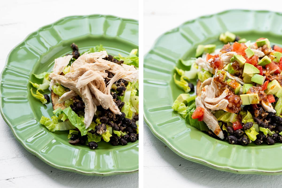 Building an easy tostada with shredded chicken, black beans, tomatoes, and avocado.